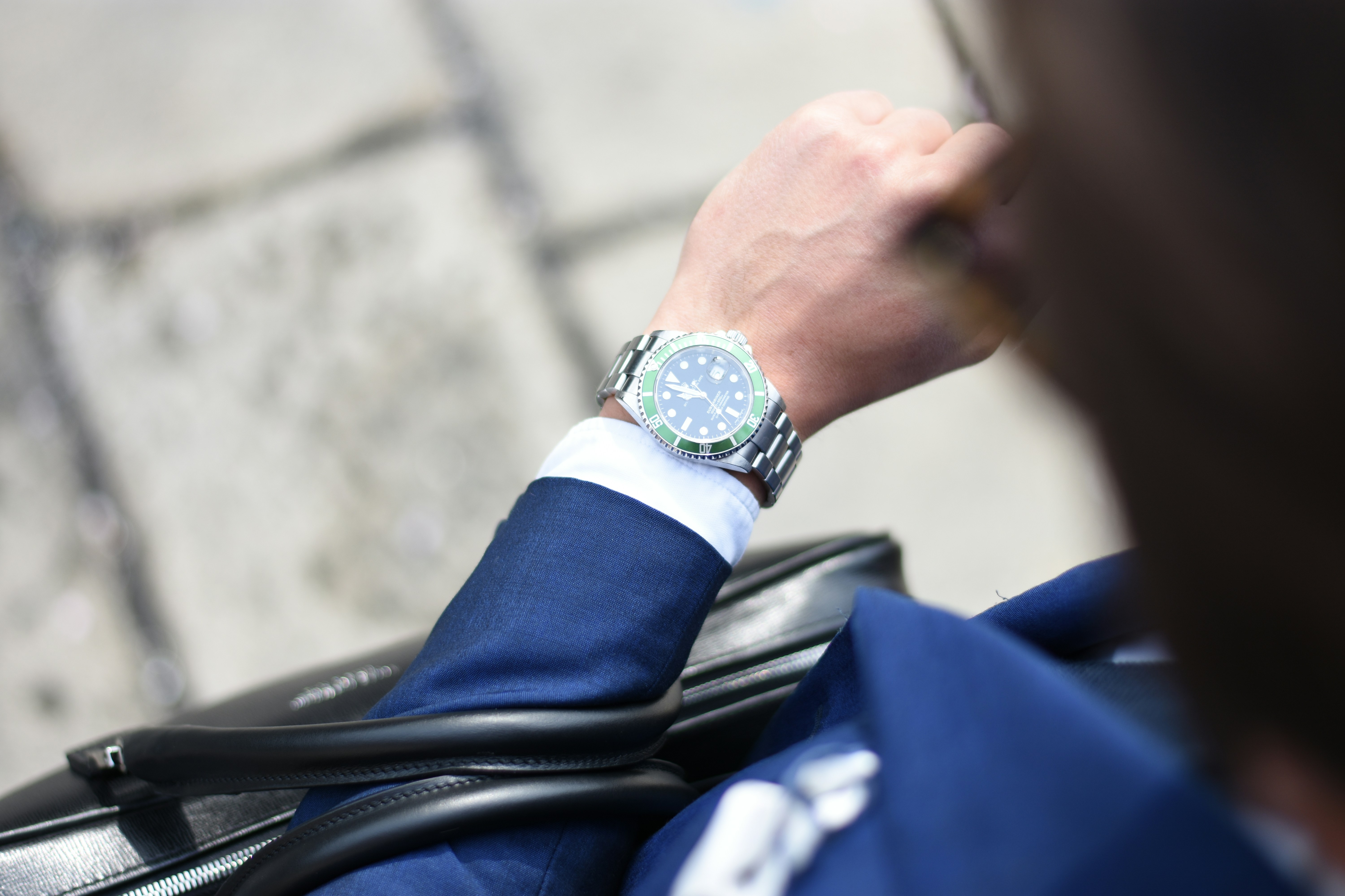 Businessman checking the time